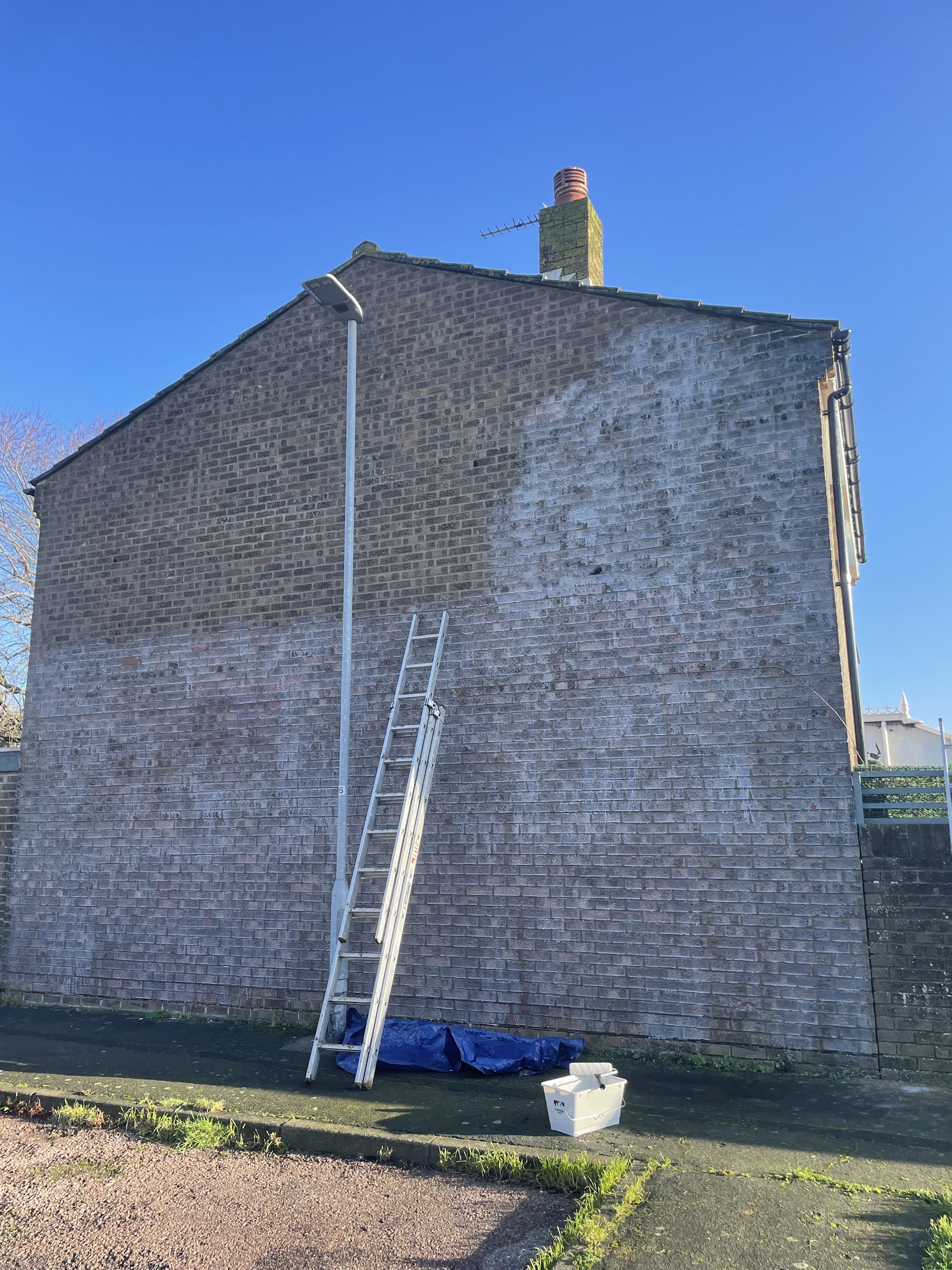Gable wall in Chatham mid-way through a full repoint with weatherproofing