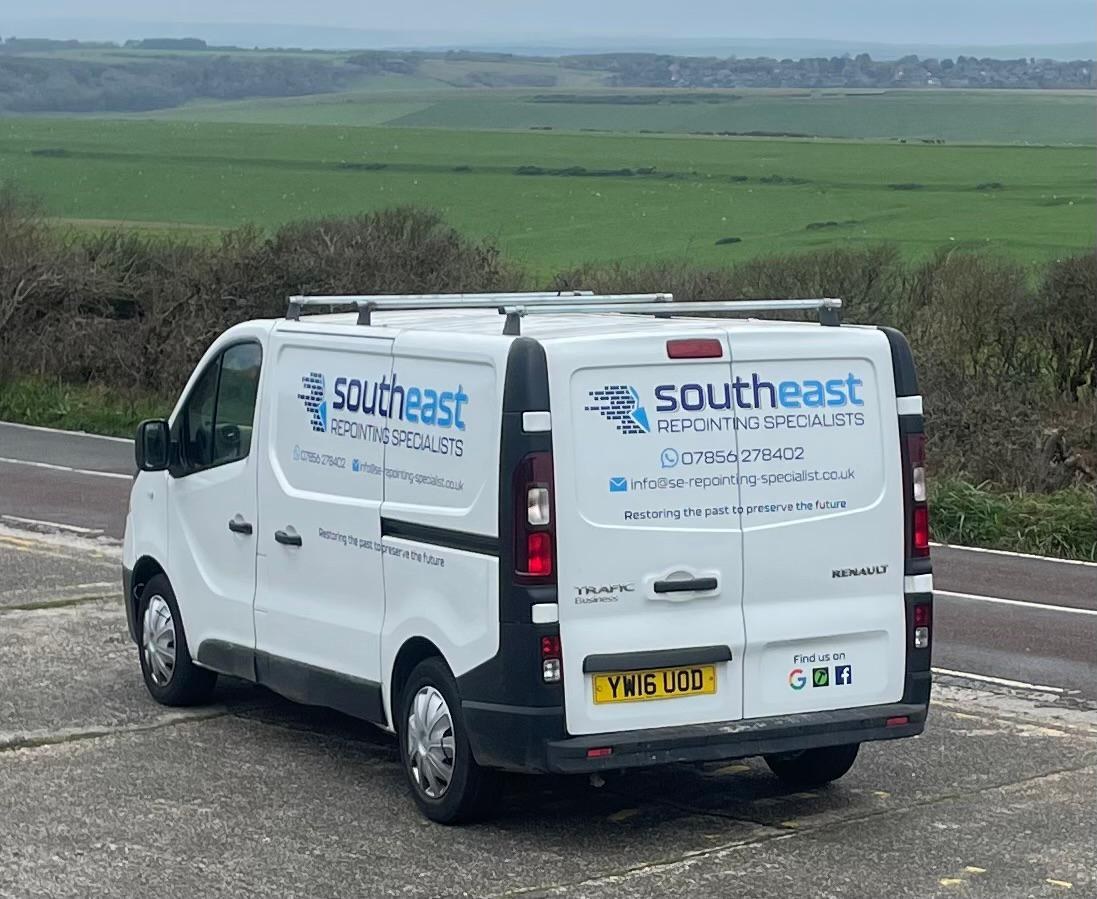 Our liveried van parked by the coast road