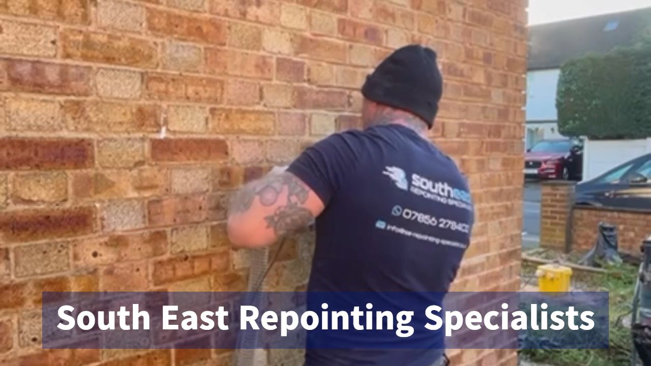 Our team grinding out mortar with dust extraction attached